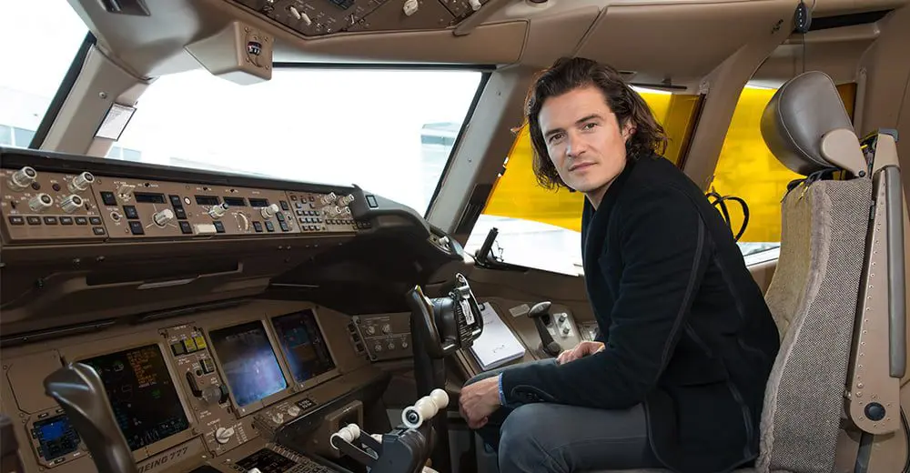 Orlando Bloom celebrates in BA cockpit in Sydney
