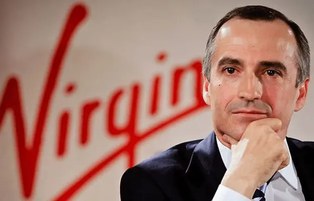 What does Virgin Australia's John Borghetti have in common with Julia Gillard?