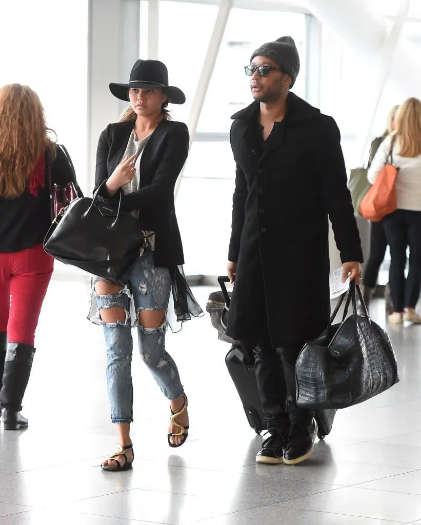 Chrissy Teigen and John Legend arrive at JFK airport in NYC