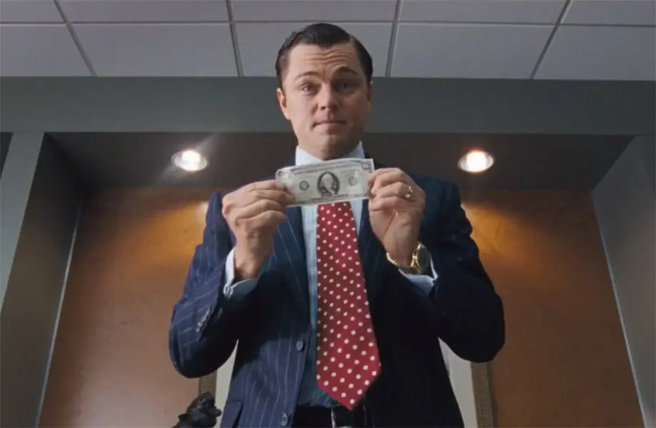leonardo-di-caprio-holding-a-money-bill-wolf-of-wall-street