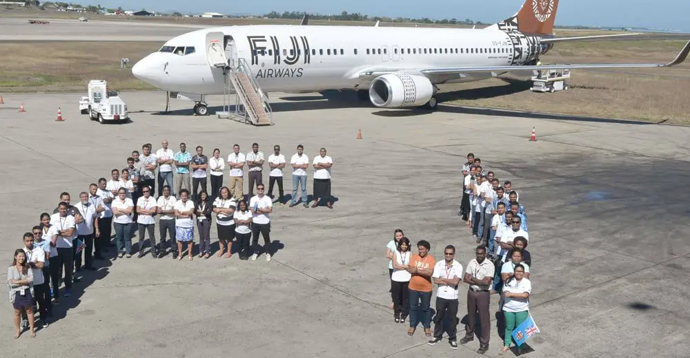 Fiji Airways Business passengers fly with an iPad