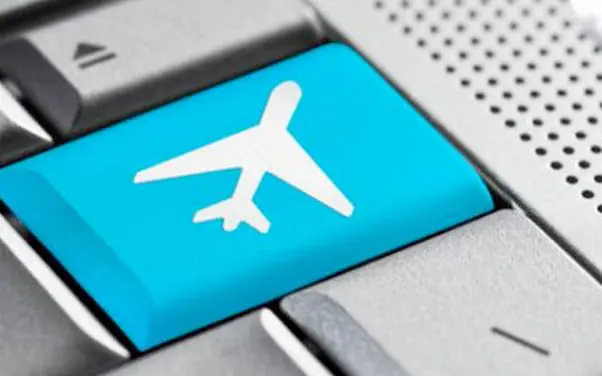 travel news plane on keyboard