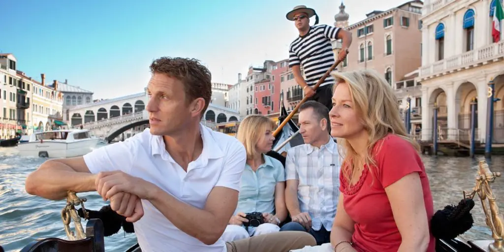 Venice postpones tourism tax for travellers visiting this summer 1 Couple Venice canal guided tours karryon