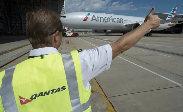 Qantas & American Airlines flights take off 12 Qantas 4
