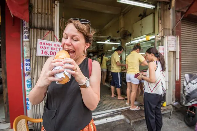 5 ways to have a life-changing travel experience 26 Intrepid Travel-vietnam_ho-chi-minh-city_food_banh_traveller-3788-2