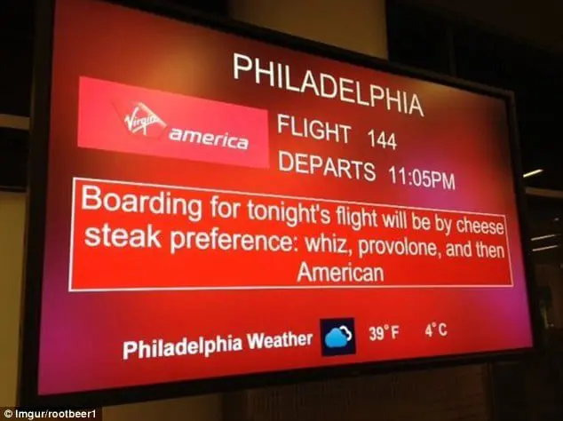 3367287800000578-3552053-This_sign_was_a_reference_to_the_plane_destination_Philadelphia_-m-16_1461251775773