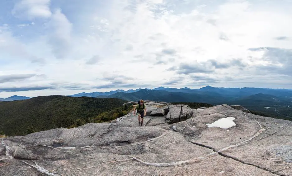 It's weird, but this is why you should think of New York State as Italy 24 Hiking man on mountain