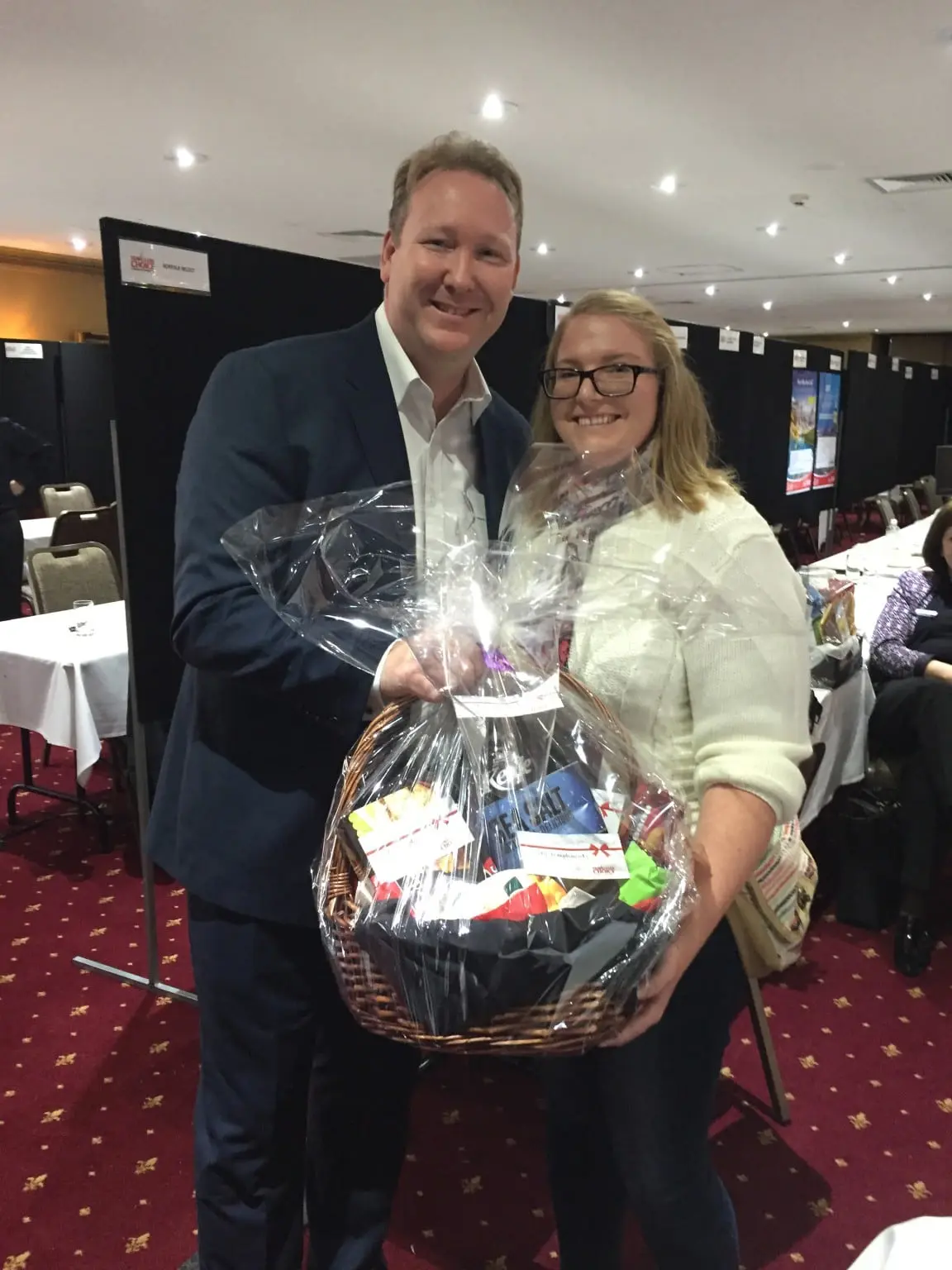The Daily Travel Agent Bite: Tues 9 Aug 30 Travel Agent TC1_Christian Hunter presents Beth Paton with gift basket_QLD Frontliners 2016