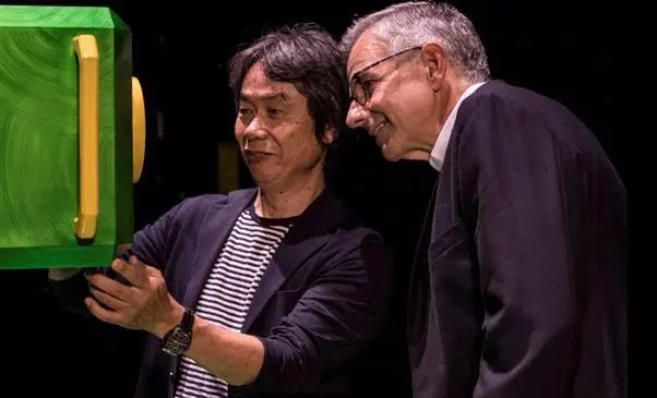 Universal creates larger-than-life Nintendo adventure 1 Shigeru Miyamoto, Senior Managing Director and Creative Fellow of Nintendo, discusses attraction features with Mark Woodbury, President of Universal Creative. © 2016 Universal Studios. All Rights Reserved.