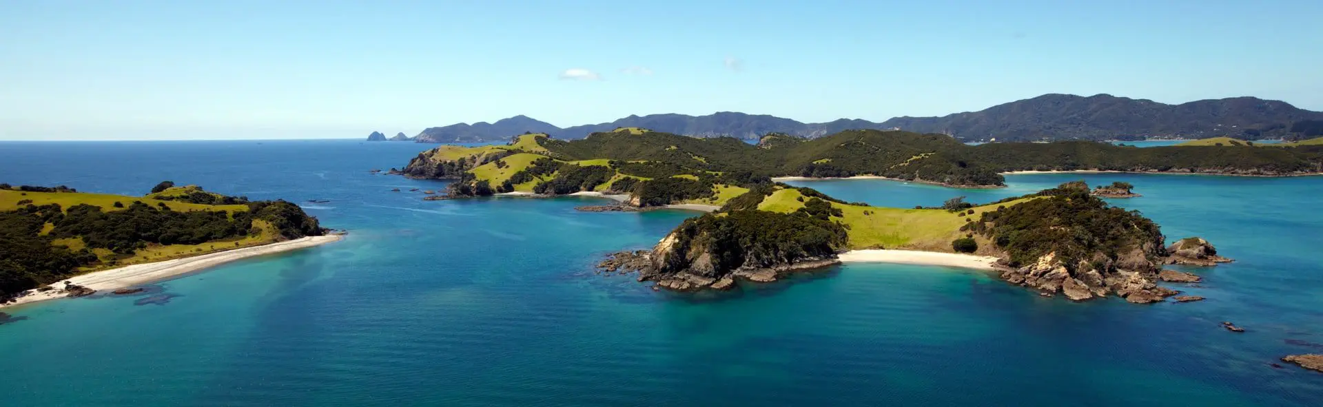 Travel Agents, expect more New Zealand bookings as new campaign launches 1 Waewaetorea passage and Urupukapuka island in Bay of Islands, New Zealand.