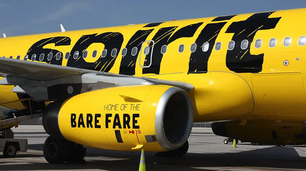 Man accused of sexually assaulting sleeping woman on a US flight while his wife sat nearby