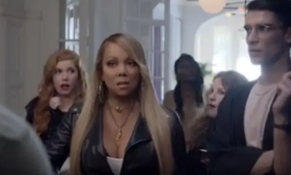 WTH is Mariah Carey doing in an ad for hostels? 15 Mariah Carey hostelworld