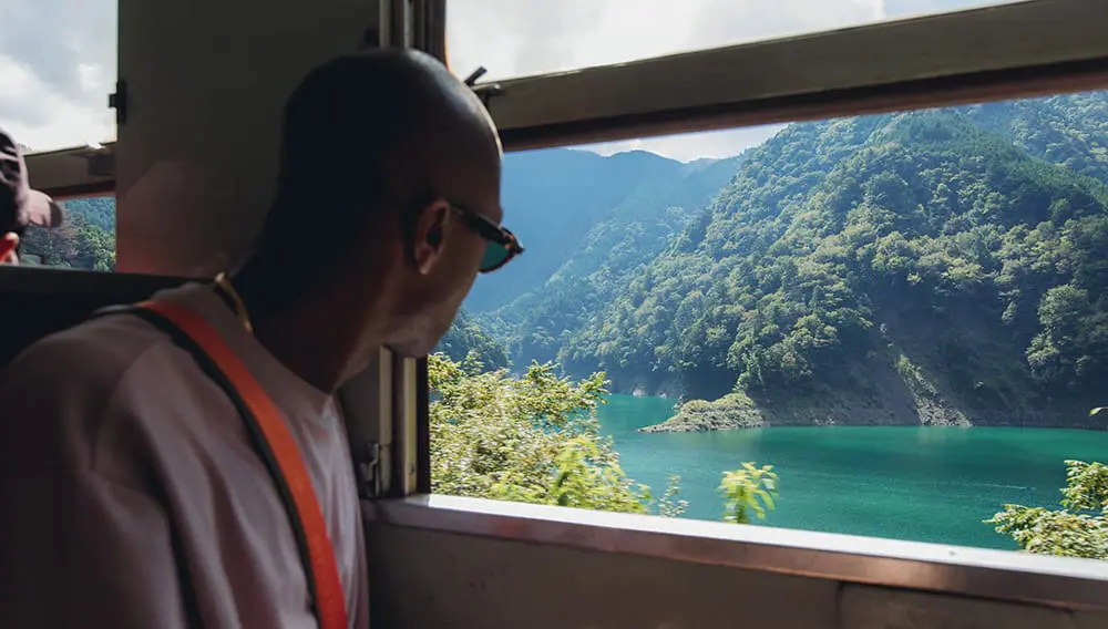 Make the connection: Intrepid Travel onboards new rail range with 40 train itineraries 2 Intrepid Travel Japan Okuoikojo viewpoint group on train at Ooigawa railway