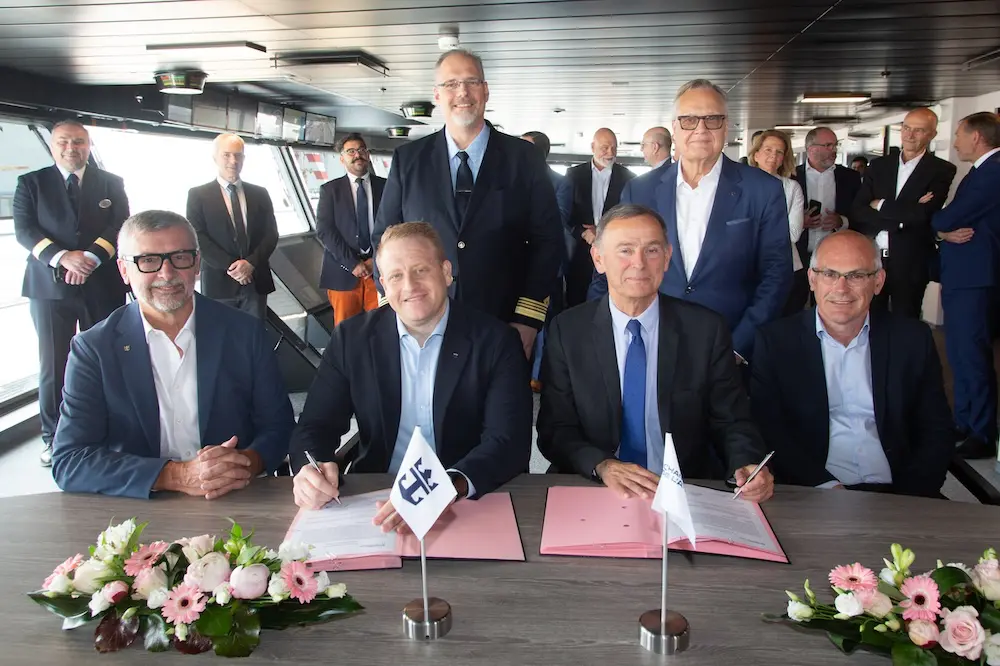 (L-R front row) Michael Bayley, president and CEO, Royal Caribbean International;  Jason Liberty, president and CEO, Royal Caribbean Group; Laurent Castaing, general manager, Chantiers de l’Atlantique ; JY Jaouen, director of operations, Chantiers de l’Atlantique 
(L-R back row) Gus Andersson, captain of Utopia of the Seas; Harri Kulovaara,executive vice president, Maritime and Newbuilding