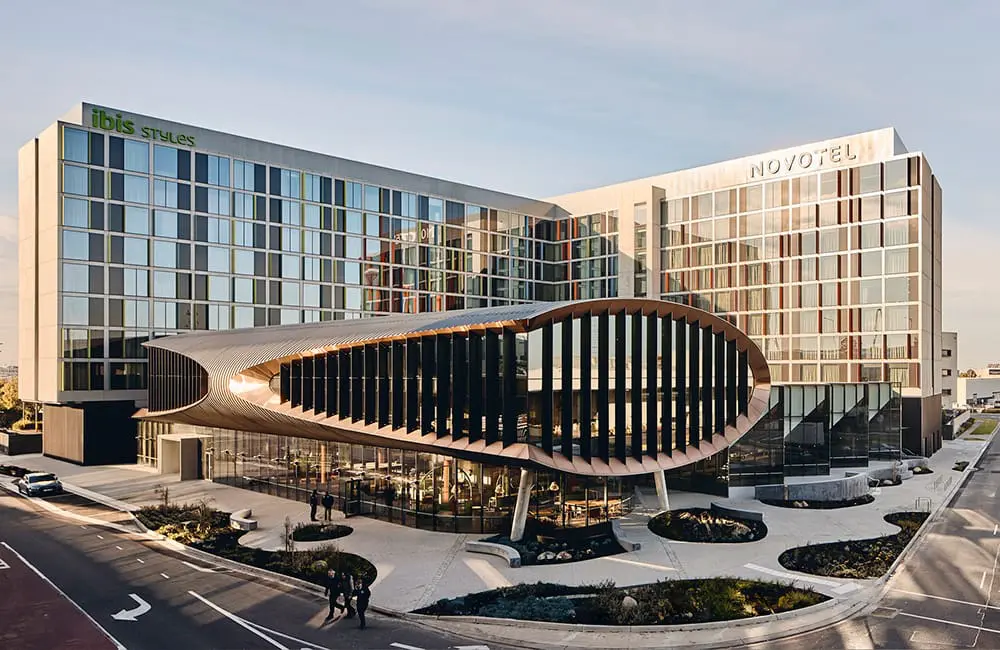 Melbourne Airport welcomes Australia's largest hotel opening of 2024 1 Exterior render of Novotel & ibis Styles Melbourne Airport.