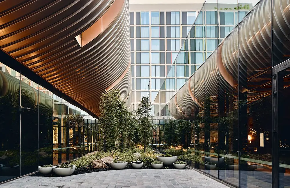 Melbourne Airport welcomes Australia's largest hotel opening of 2024 7 Render of planted internal courtyard at Novotel & ibis Styles Melbourne Airport.