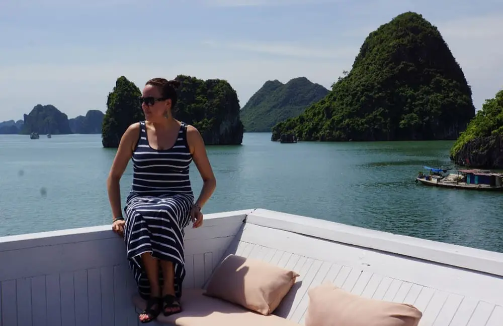 Movers + Shakers: Trails of Indochina adds Nadina Bross as ANZ Sales & Business Development Director 1 Woman on luxury cruise in Halong Bay, Vietnam.
