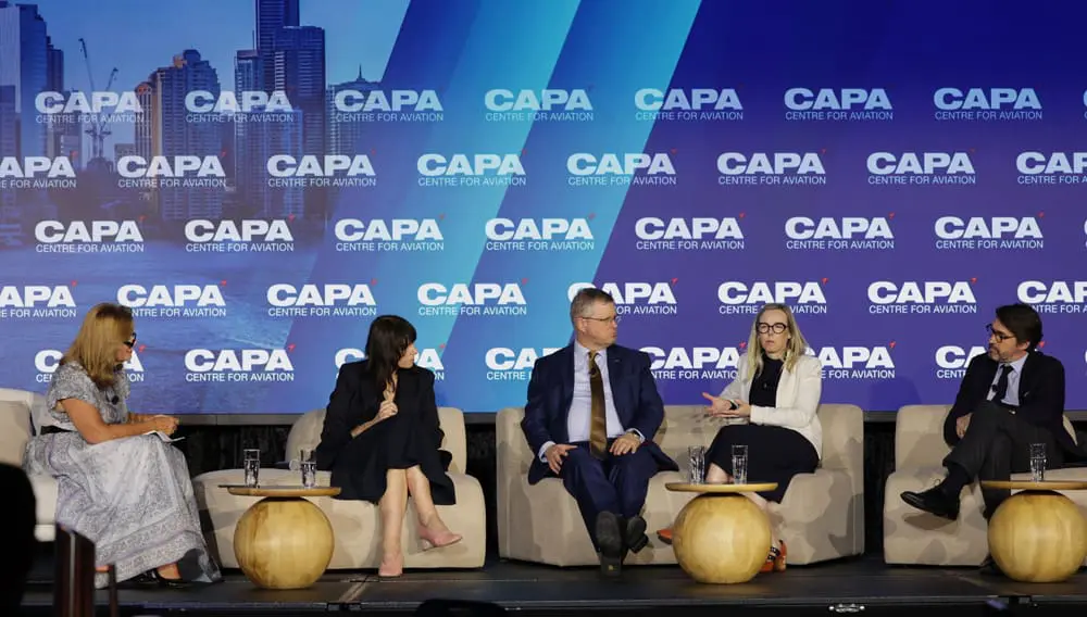 Panel and moderator on stage at CAPA Airline Leader Summit Australia Pacific 2024 in Brisbane.