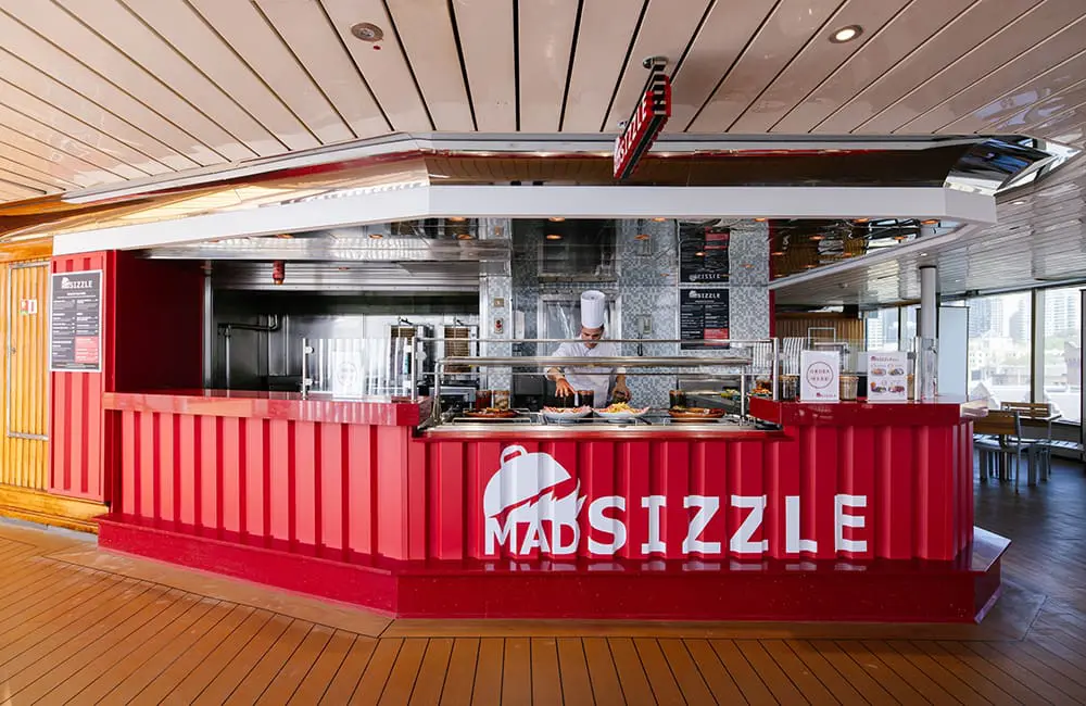 Carnival Splendor reveals shipshape dry dock renos with trade partners in Sydney 5 The newly introduced dining venue Mad Sizzle on board Carnival Splendor.