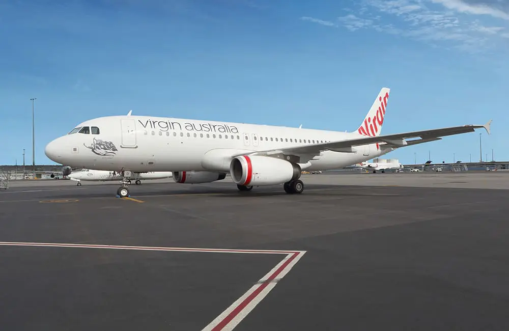 Virgin Australia aircraft on tarmac – expanded partnership with Amadeus.