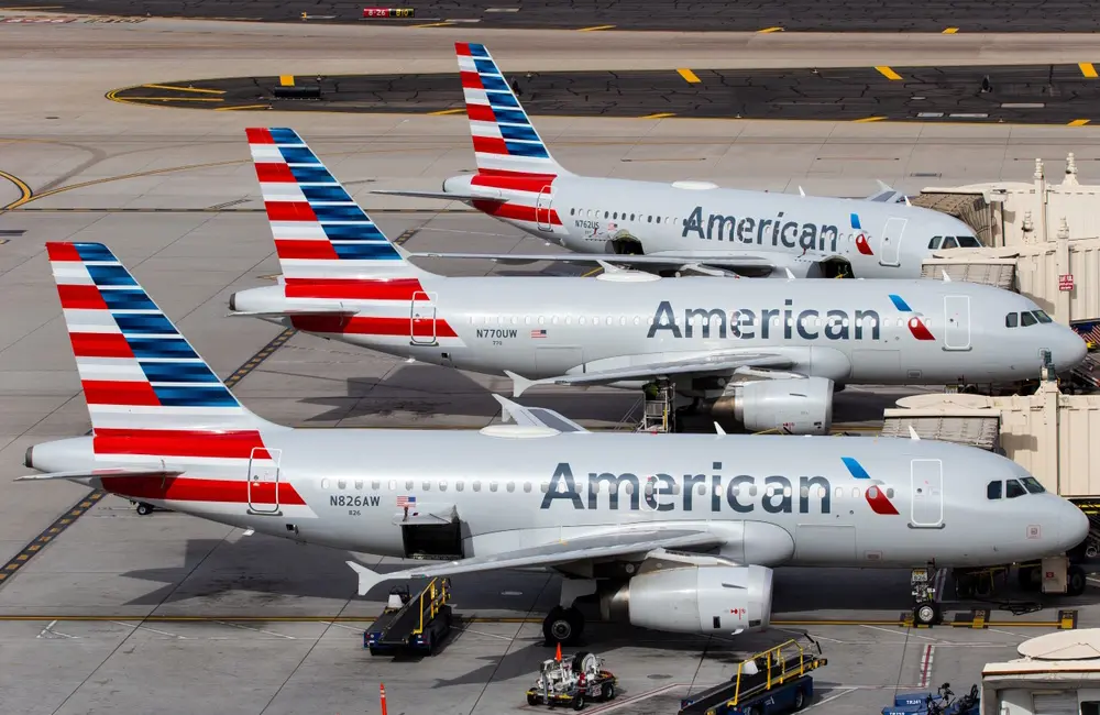 AA cops record $50M fine for mishandling passengers with wheelchairs & mobility aids 2 American Airlines planes lined up at Phoenix Sky Harbor International Airport. Image: Wenjie Zhang/Shutterstock