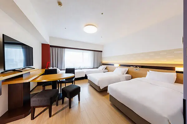 Make a Japan train holiday rail-ly easy for your clients with JR-East Hotels 5 East Wing Family room at Hotel Metropolitan Edmont Tokyo.