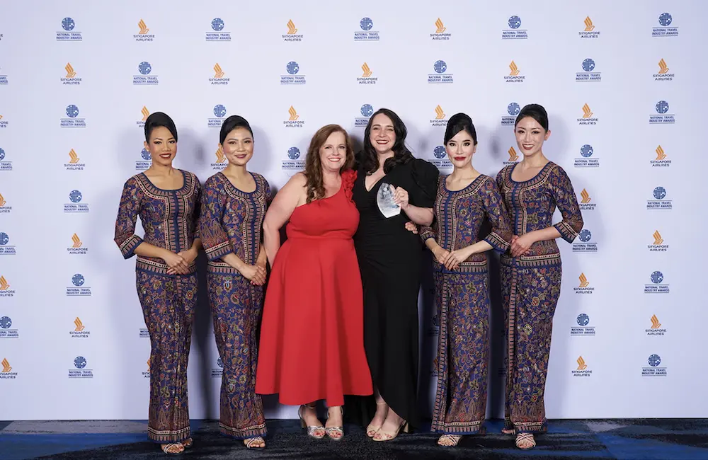 Flight Centre’s Rosie Loxley (holding award) at NTIA 2024. Singapore Airlines 2025 NTIA Major Sponsor