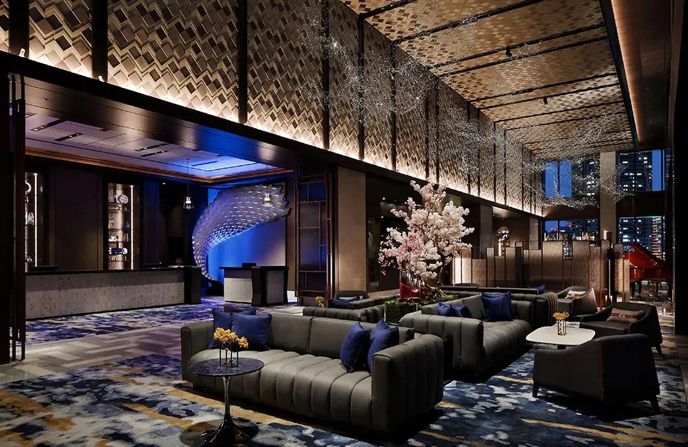 Make a Japan train holiday rail-ly easy for your clients with JR-East Hotels 4 mesm Tokyo lobby at night.