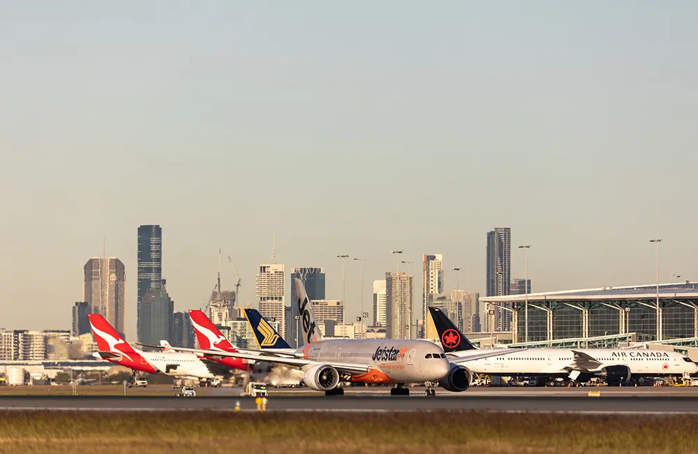 Brisbane Airport breaks two records in one day –including its busiest 24 hours since 2019 2 Aircraft lined up on tarmac at Brisbane International Airport. Image: BAC