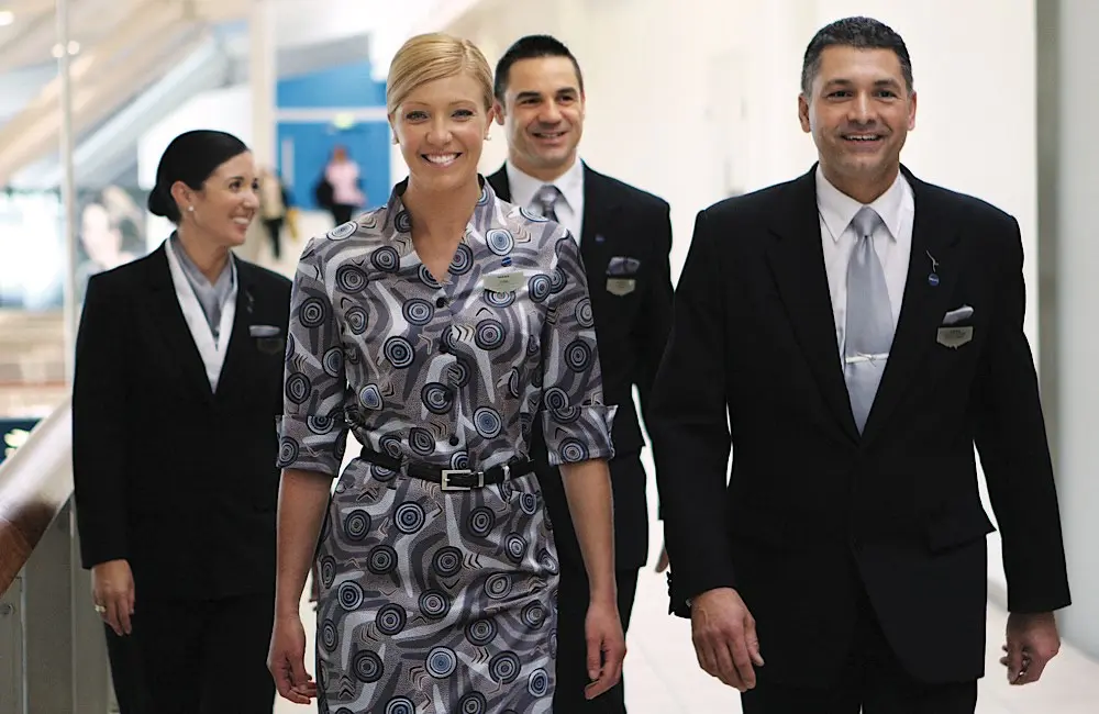 From runway to runway: Qantas uniform gets a makeover – but who’s designing it? 2 A modern take on heritage: The 2003 Qantas uniform by Peter Morrissey featured contemporary cuts with Indigenous-inspired prints. Will the next iteration carry a similar cultural touch?