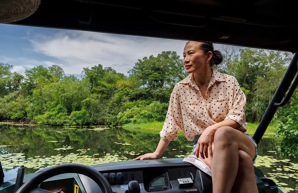 This familiar Aussie face is dishing the goods as the Northern Territory’s newest ambassador 2 Woman in boat on wetlands Finniss River Lodge near Darwin. Credit Toby Zerna for Tourism NT