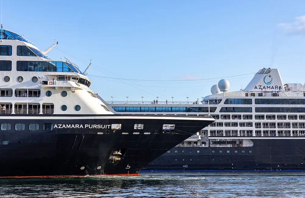 Decked out for summer 2025-26: Azamara cruises back Down Under with two ships 3 Close-up of Azamara Pursuit and Azamara Onward cruise ships in Sydney Harbour.
