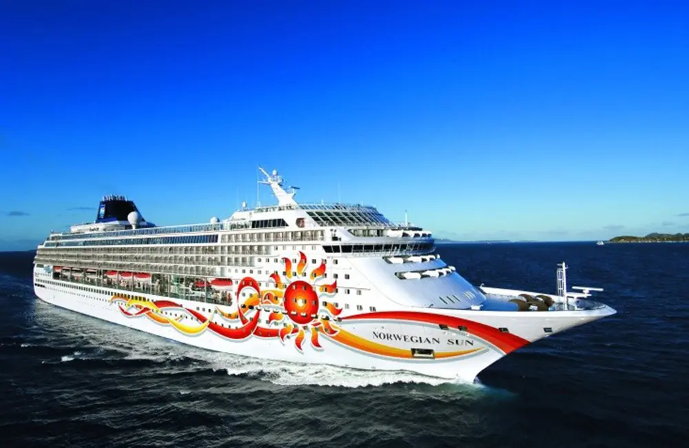 NCL surge in Asia: More cruises, more homeports & more destinations in 2025-2027 2 Aerial image of Norwegian Sun cruise ship at sea. Image: NCL