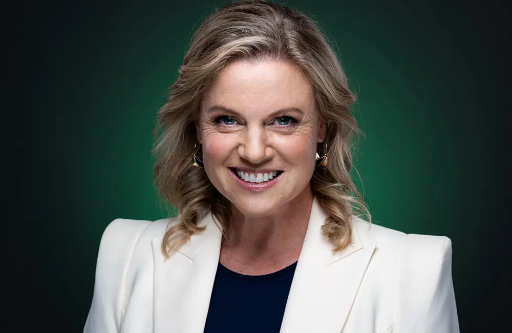 Adventure World joins CLIA, going all in as an Executive Partner to boost cruise-land journeys 1 Corporate headshot of woman against green background.