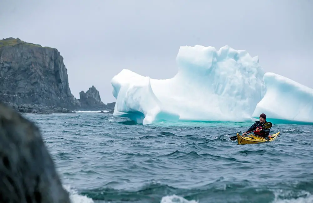 Atlantic Canada in autumn: 4 East Coast provinces with diverse cultures, sea-to-table flavours & alluring nature 1 Kayak past Iceberg Alley off the Newfoundland & Labrador coast. Image: Destination Canada