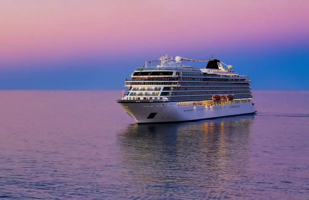 Viking Vesta joins Viking’s fleet of ocean cruise ships 2 Render of Viking Libra cruise ship at sea with pink sky.
