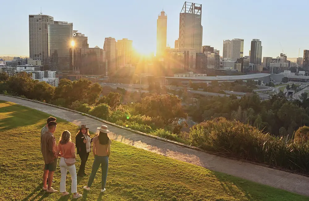 Qantas confirms 2 new international routes will return in 2025; drops Australia-wide sale 3 Nyungar Tours Aboriginal Cultural Tour of Kings Park, Perth at sunset. Image: Tourism WA