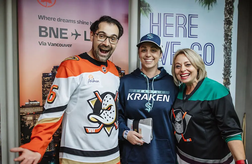 Brisbane swings big with bumper turnout at U-S-eh event with BNE, Air Canada & Linkd Tourism 4 Air Canada Anaheim trip winner ecruising’s Lauren Wall (centre) with Linkd Tourism's Michael Cassis and Air Canada's Janis McDonald.