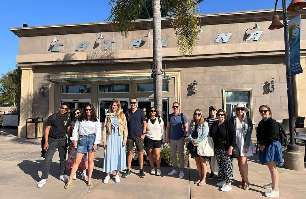 LA Tourism & Infinity Holidays launch new incentive after Aussie agents return from co-hosted fam 6 Infinity Holidays x LA Tourism famil group at Catalina Island sign.