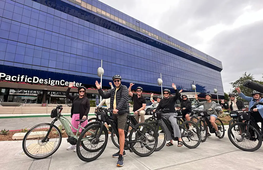 LA Tourism & Infinity Holidays launch new incentive after Aussie agents return from co-hosted fam 4 LA Tourism x Infinity Holidays famil group cycling outside Pacific Design Centre.