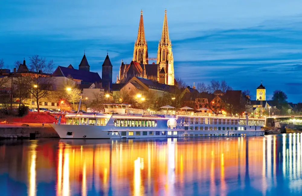 Current affairs: Trafalgar charts a new course for Europe river cruising in 2026 – and agents get first dibs 2 Trafalgar river cruise ship at night.