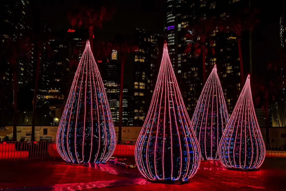 Vivid Sydney 2025: Lights on for 15th anniversary amid weather woes 8 Lumina Dream is a series of raindrop-shaped sculptures, that use real-time meteorological data to transform the installation into a living, breathing reflection of the natural world. Artist - ONGA Artful Light Company
