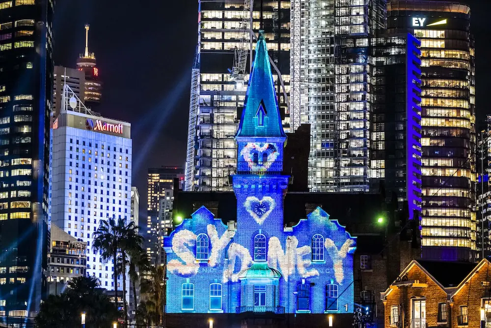 Vivid Sydney 2025: Lights on for 15th anniversary amid weather woes 1 VividSydney_2025_TheRocks_ColourtheCity_CREDITDestinationNSW_KM-88844