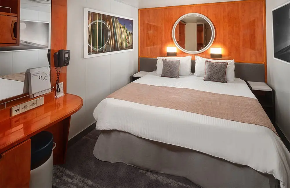 NCL updates, ahoy! Norwegian Epic & Pride of America get a glow-up before 2025 summer season 4 Render of new inside stateroom on Pride of America.