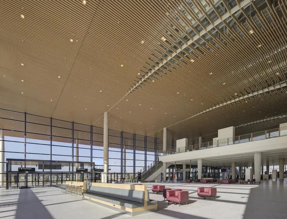 Western Sydney Airport unveils terminal, hitting major milestone on path to opening 5 WSI interior. (Image by Brett Boardman)