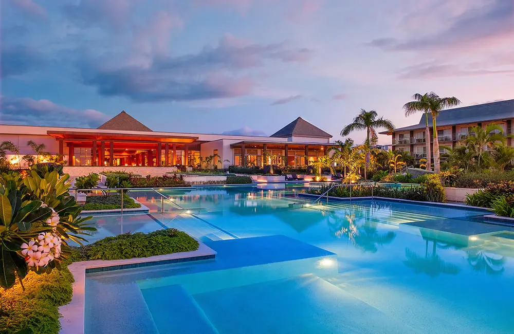 Movers + Shakers: Crowne Plaza Fiji Nadi Bay Resort & Spa adds new GM Sudhir Yadav 2 Exterior of Crowne Plaza Fiji Nadi Bay Resort & Spa at night.