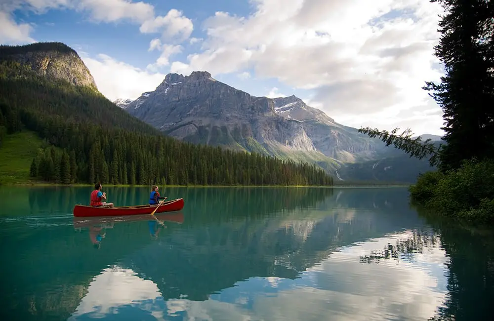 Free admission & discounted camping: This Parks Canada offer is too good to pass up 3 Kayaking at Emerald Lake, in BC's Yoho National Park – Parks Canada. Image: Dave Heath