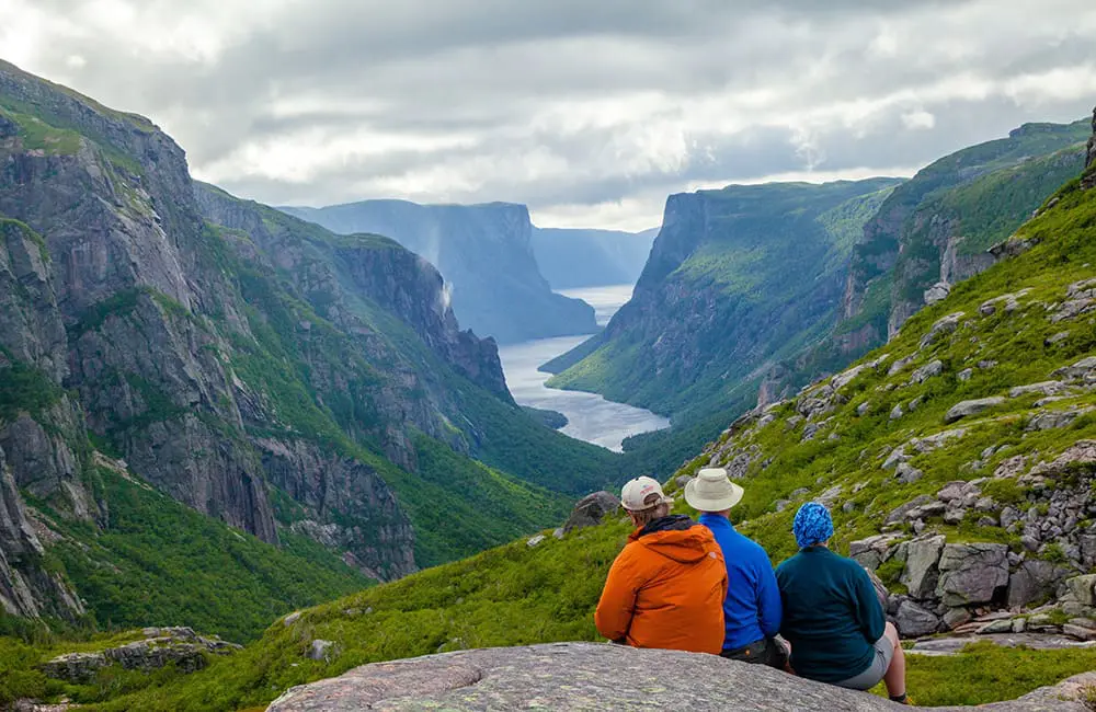 Free admission & discounted camping: This Parks Canada offer is too good to pass up 2 Surveying the scene at Gros Morne National Park. Image: Newfoundland and Labrador Tourism