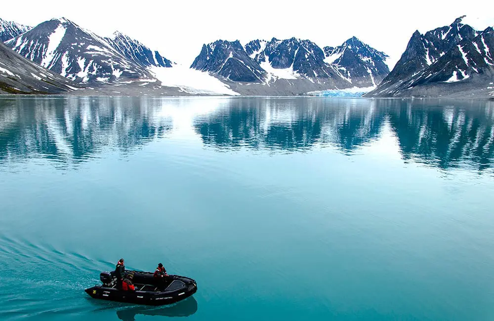G Adventures makes a polar power move with double the ships to the Arctic & Antarctic by July 2025 2 Explore by Zodiac in Norway's Svalbard region with G Adventures polar expeditions. Image: G Adventures