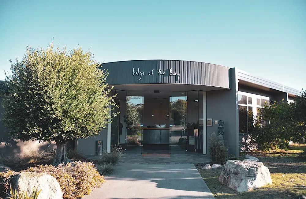 Why Intrepid bought a resort in Coles Bay and what it means for the industry 1 The Edge of the Bay has operated as a family-run property since 1980. Intrepid plans to gradually introduce sustainability-focused enhancements.